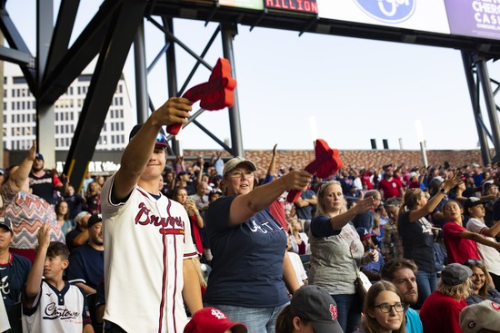 ATLANTA, GA - OCTOBER 9: Fans perform the tomahawk chant during Game Five of the National League Division Series between the Atlanta Braves and the St. Louis Cardinals at SunTrust Park on October 9, 2019 in Atlanta, Georgia. (Photo by Carmen Mandato/Getty Images)
