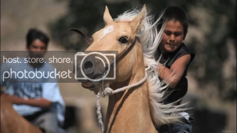 Young Lakota Rider on Palomino