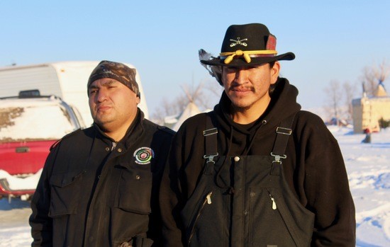 Headsman Lewis Grassrope (Lower Brule) and Ike Weston (Oglala)