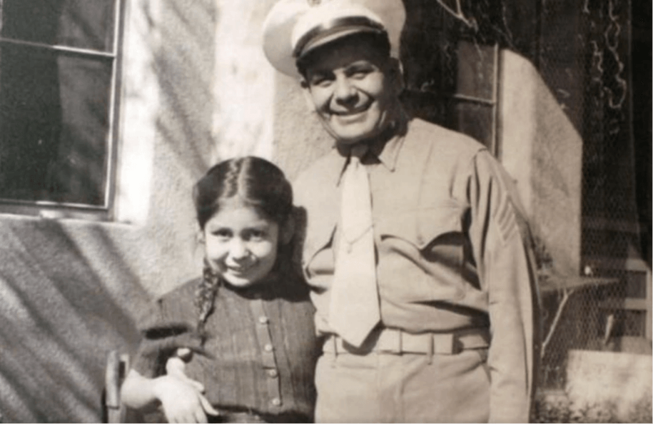 This image shows a photograph of Miguel Trujillo of Isleta Pueblo and his daughter that is on display as part of an exhibit at the Indian Pueblo Cultural Center in Albuquerque, New Mexico. Trujillo fought in 1948 for the right of American Indians to vote in New Mexico.